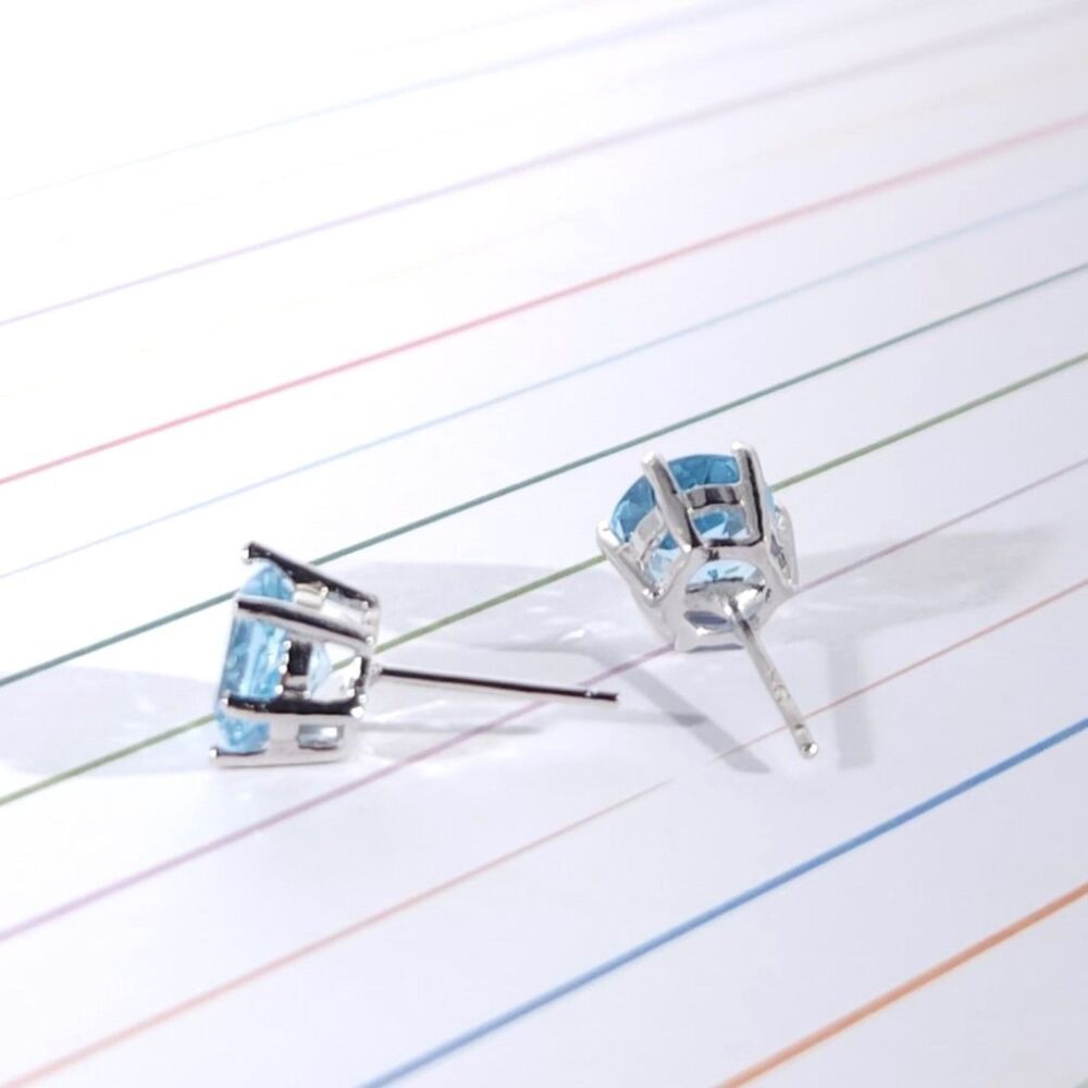 Sky Blue Topaz 4.6 Carats tw Stud Earrings Sterling Silver - Picture 4 of 4